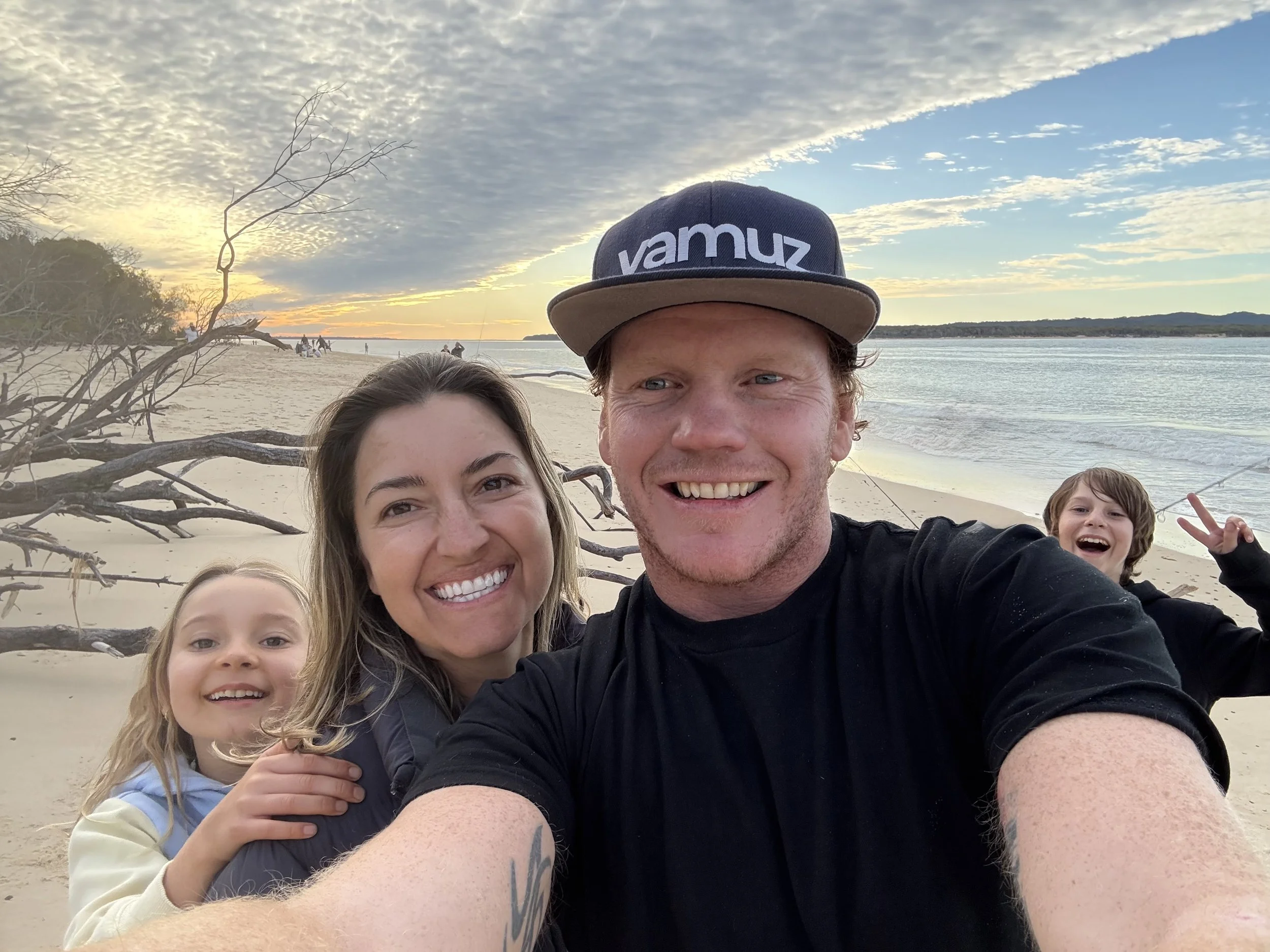 The family behind Vamuz — Sunshine Coast beach at sunset