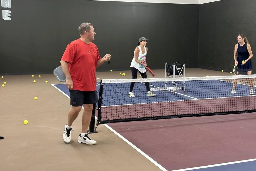 John Kleinschmidt coaching a drill session at Club 65