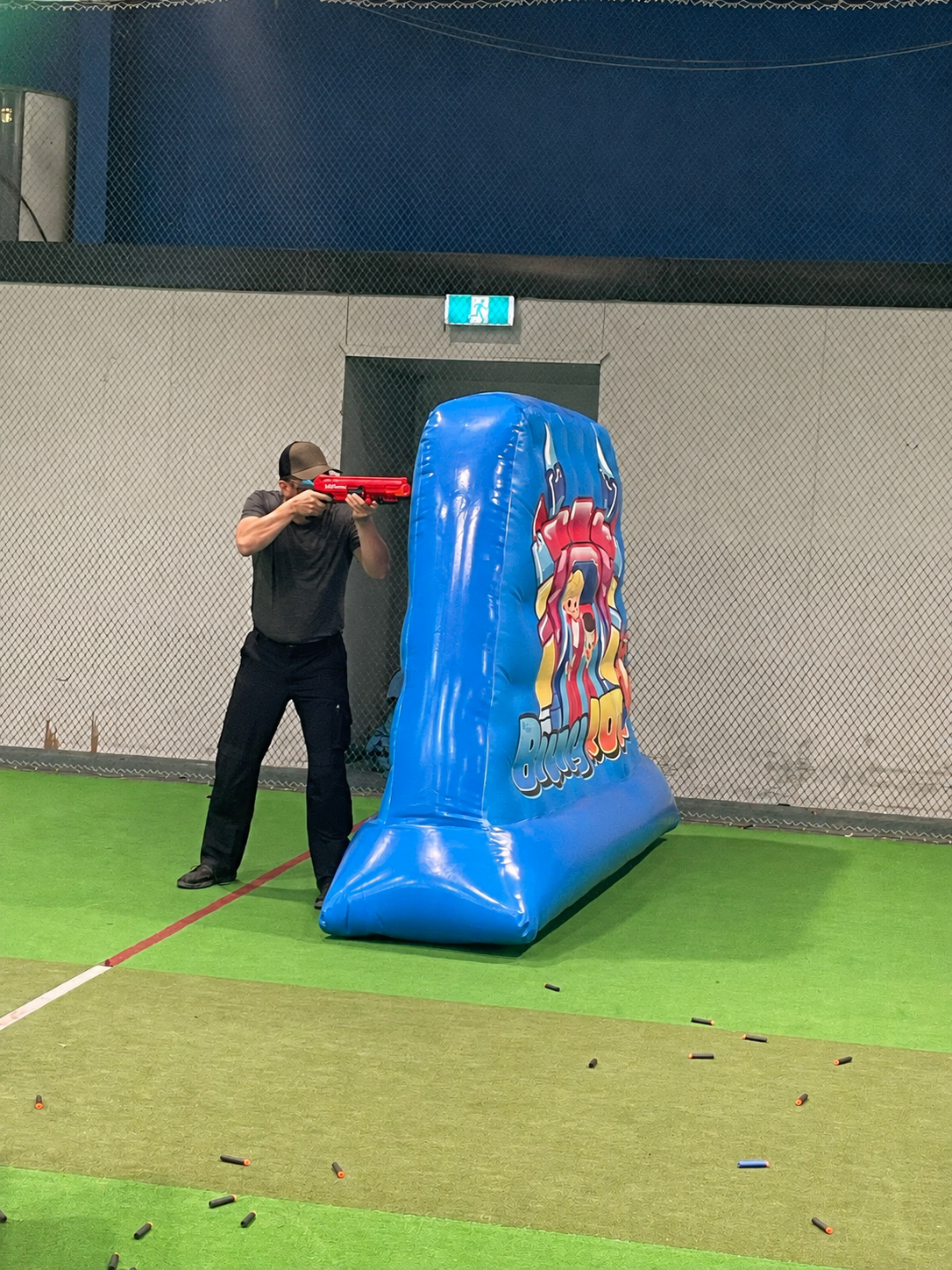 Child playing Nerf at BouncyRoos party