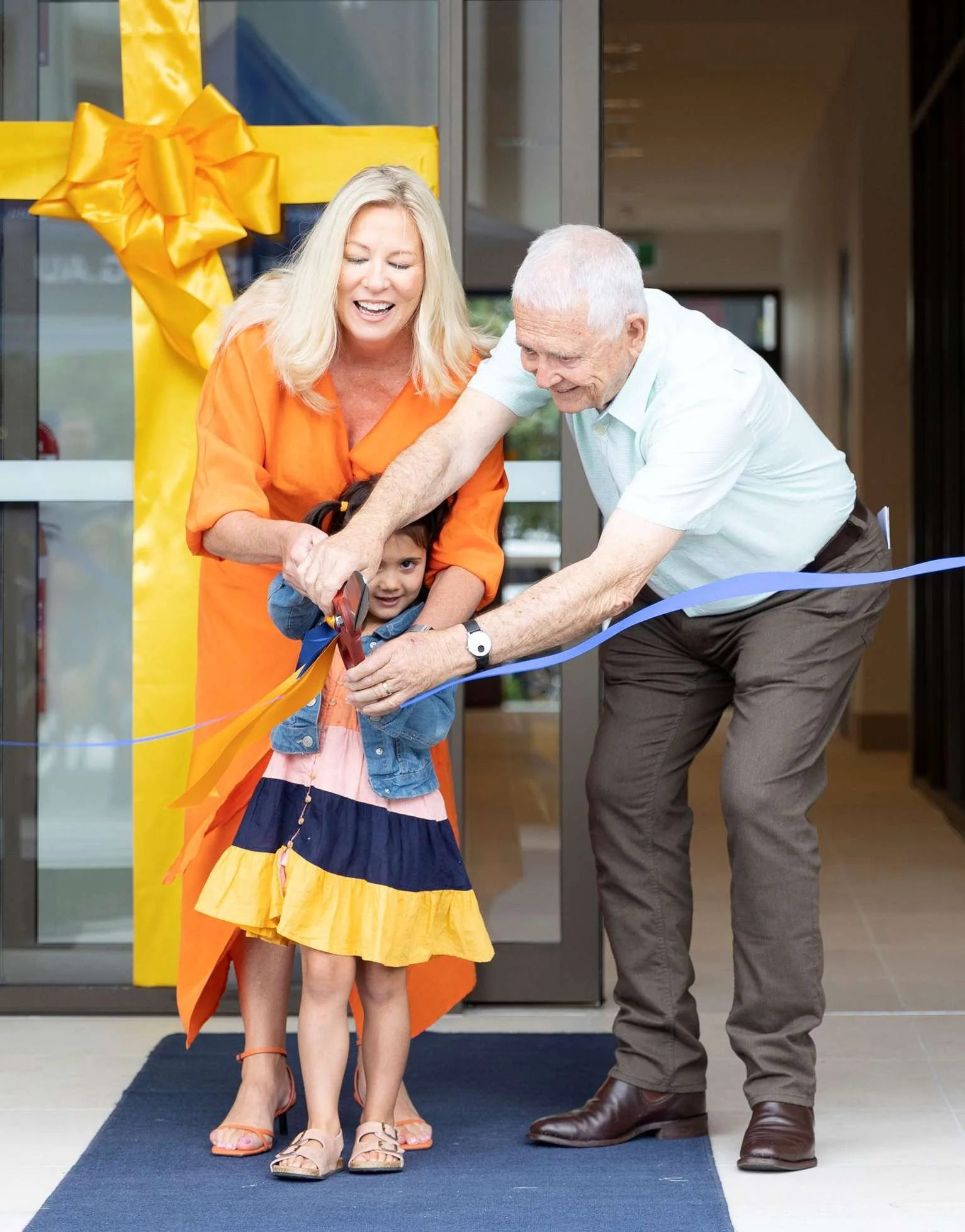 Lisa and Tony Long cutting the opening ribbon of The Wishlist Centre