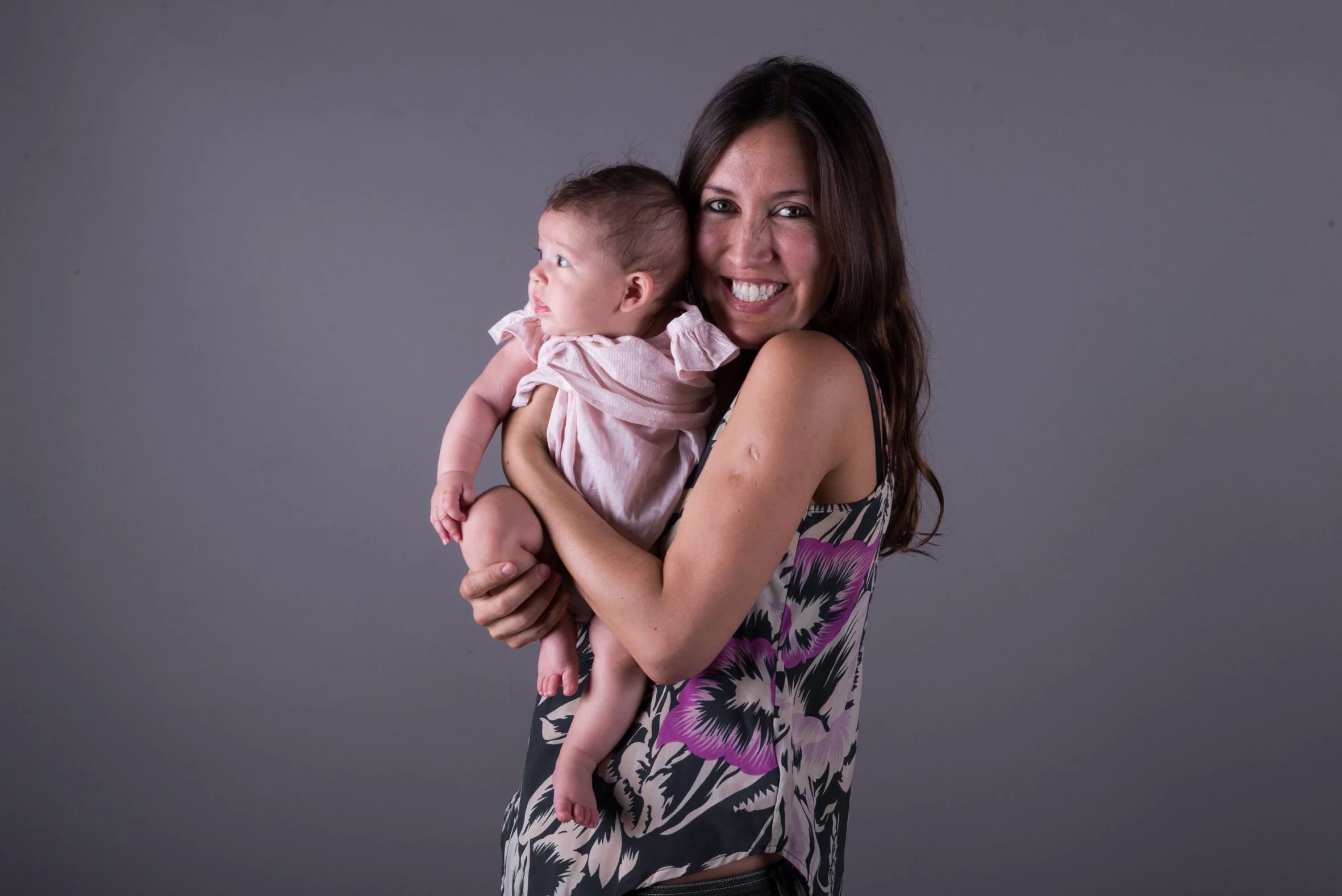 A new mother in a contemplative moment
