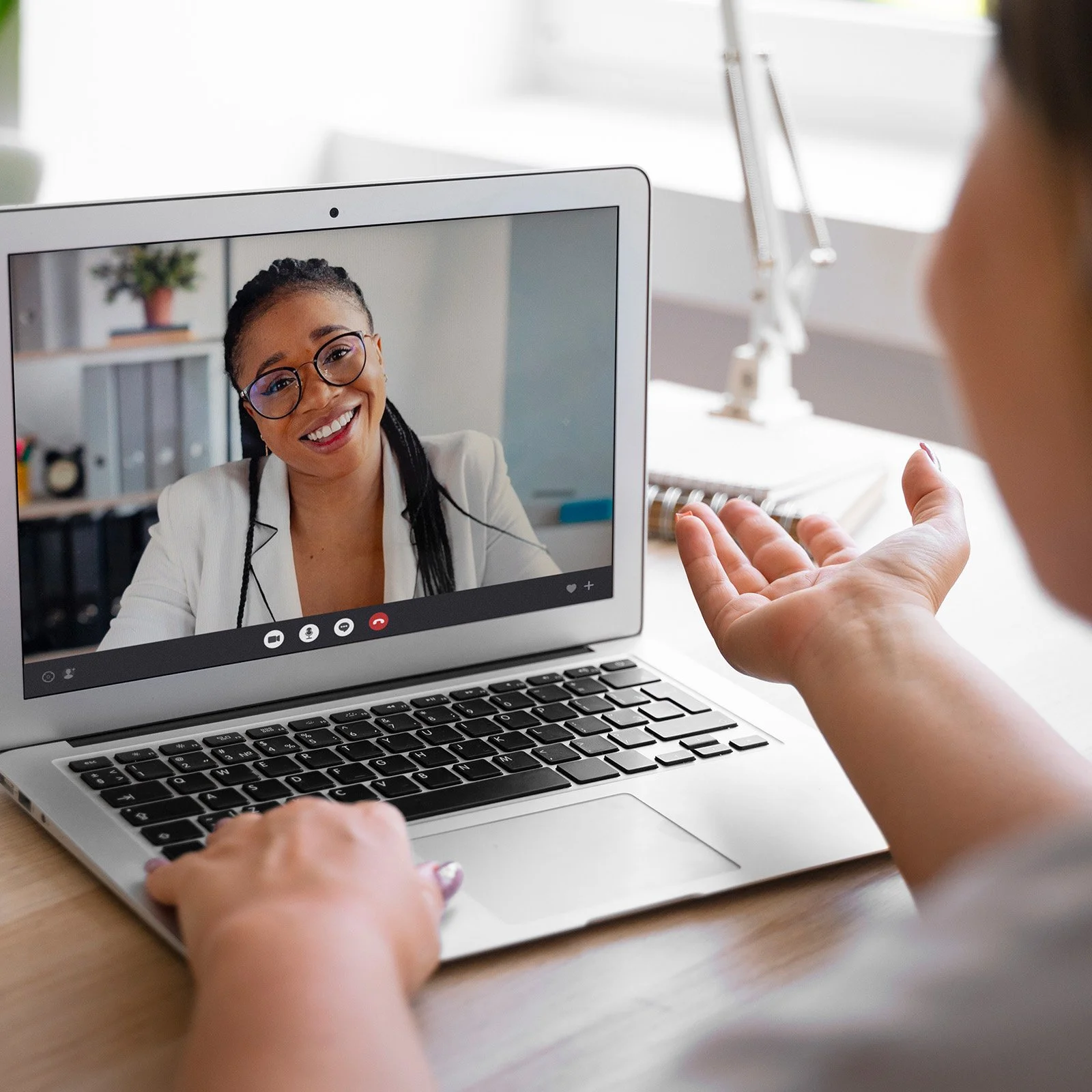 Woman sitting on sofa look at tablet