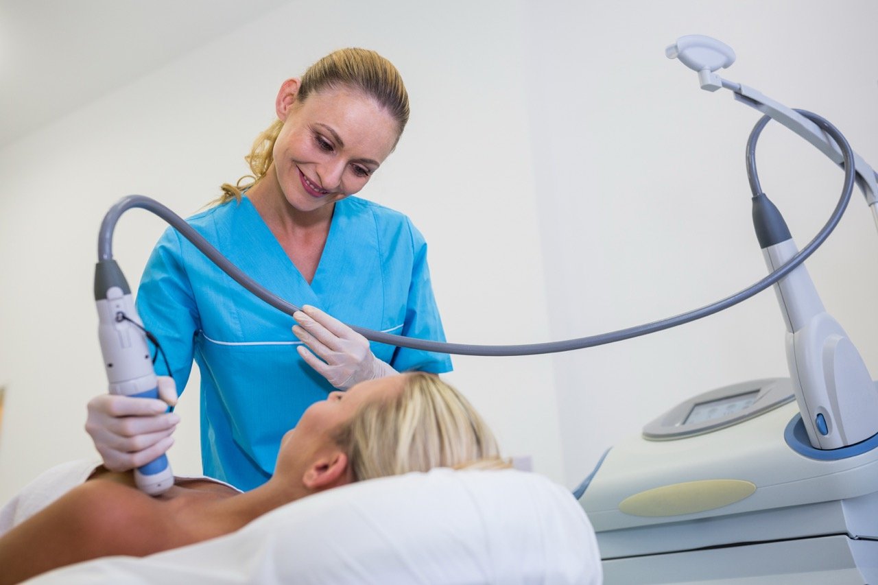 Skin therapist carrying out an advanced device treatment