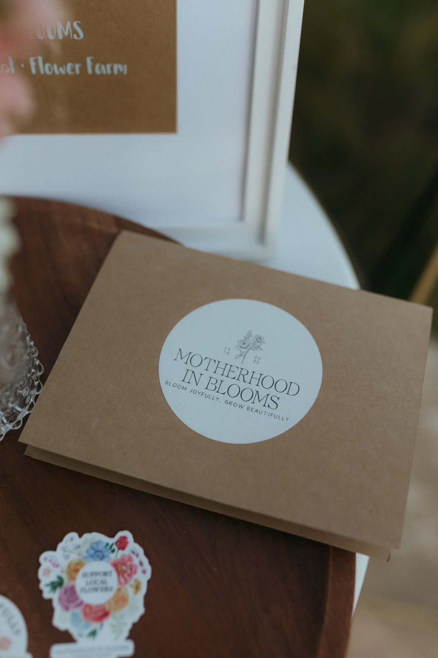 Motherhood in Blooms branded gift packaging