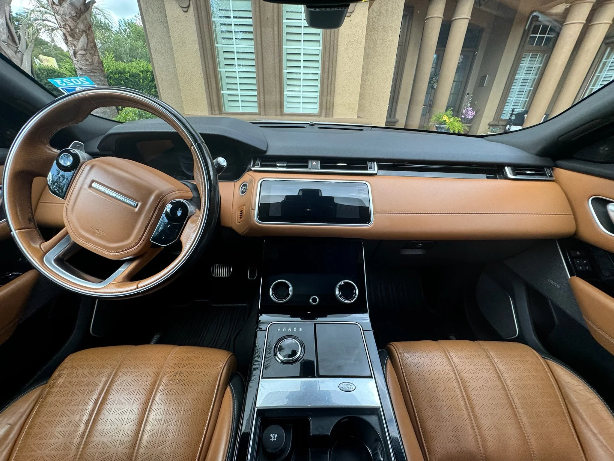 Tan Range Rover interior detailed by Kraken Harbor