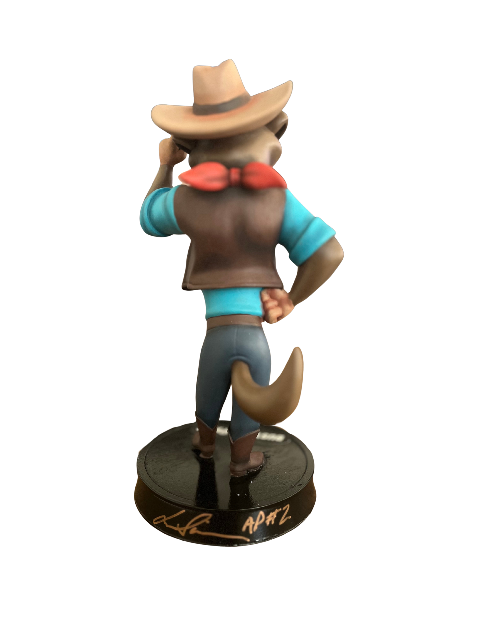 Back of the Buster Paws collector statue with its signed base