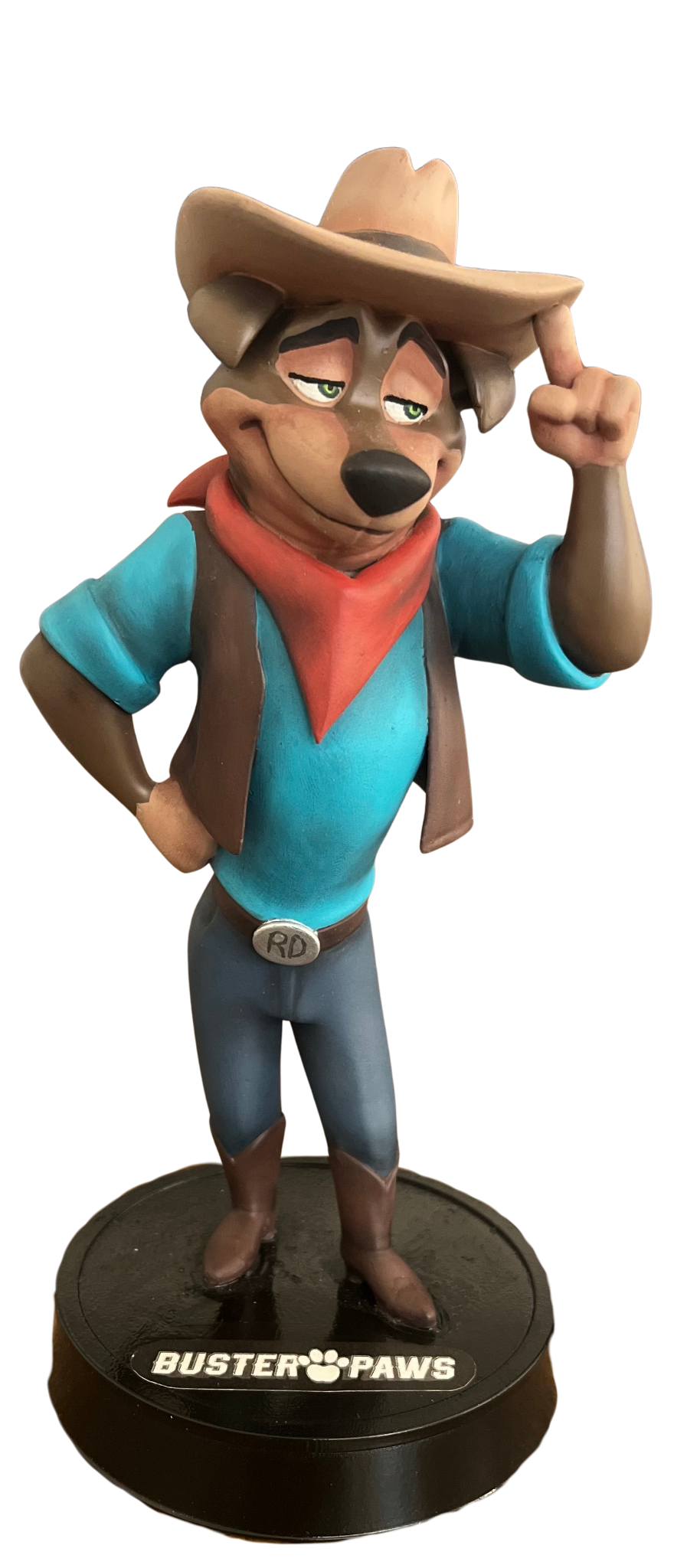 Front of the hand painted Buster Paws collector statue tipping his cowboy hat