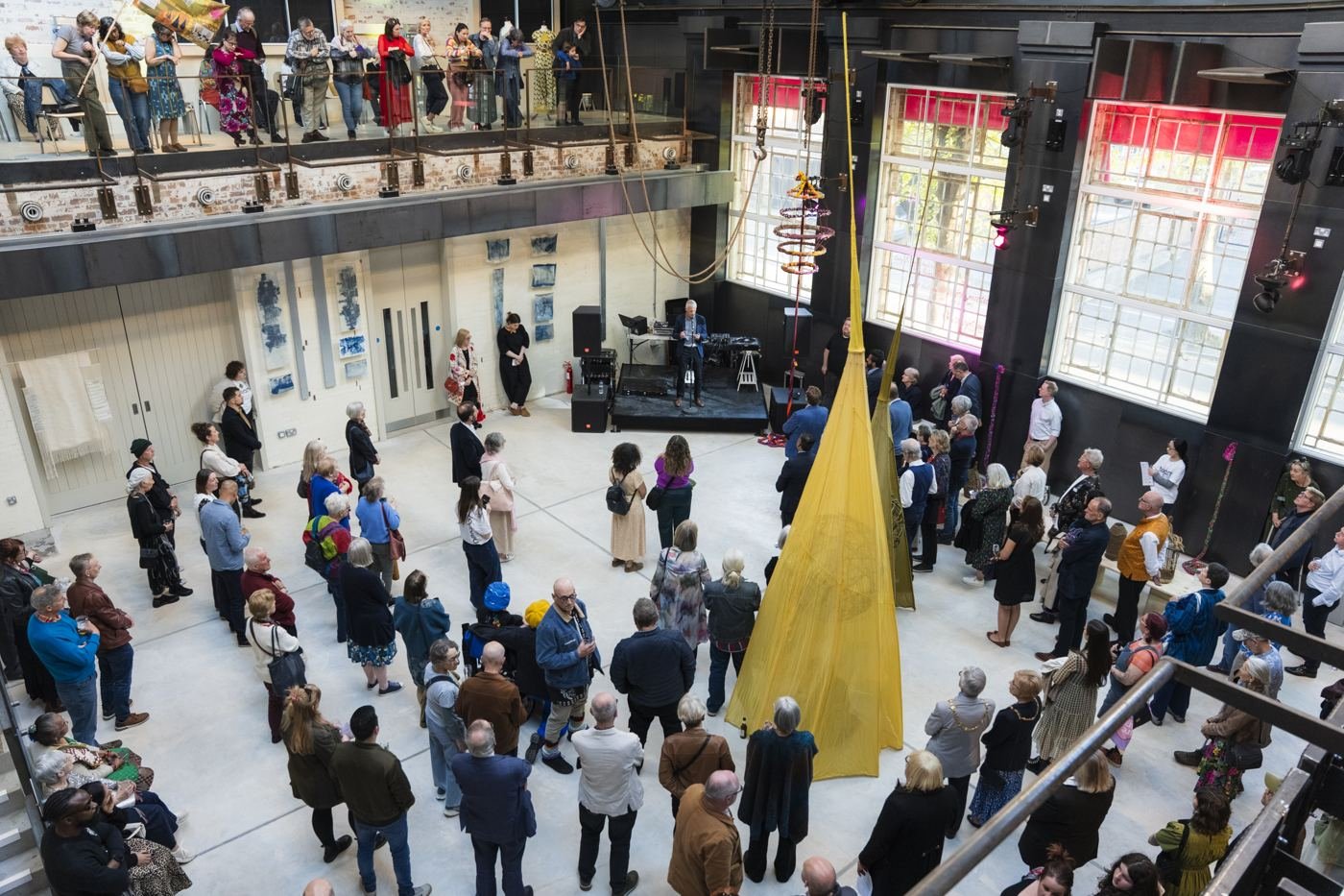 Guests at the opening event, seen from the mezzanine
