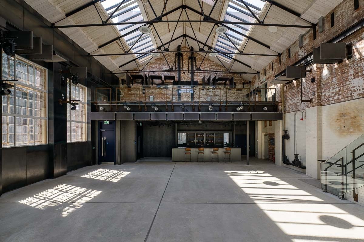 The hall with natural light and the staircase to the mezzanine