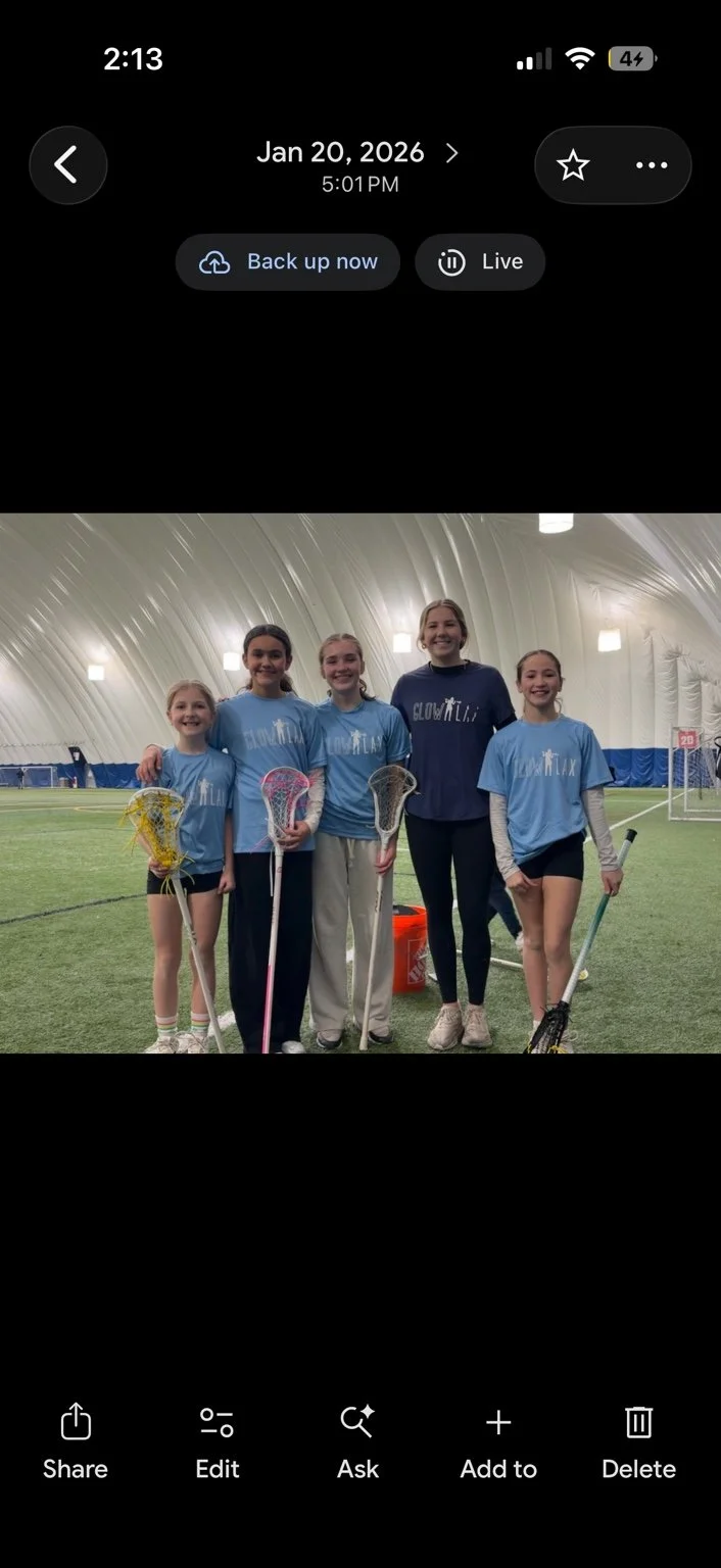 GLOW coaching team at an indoor clinic.