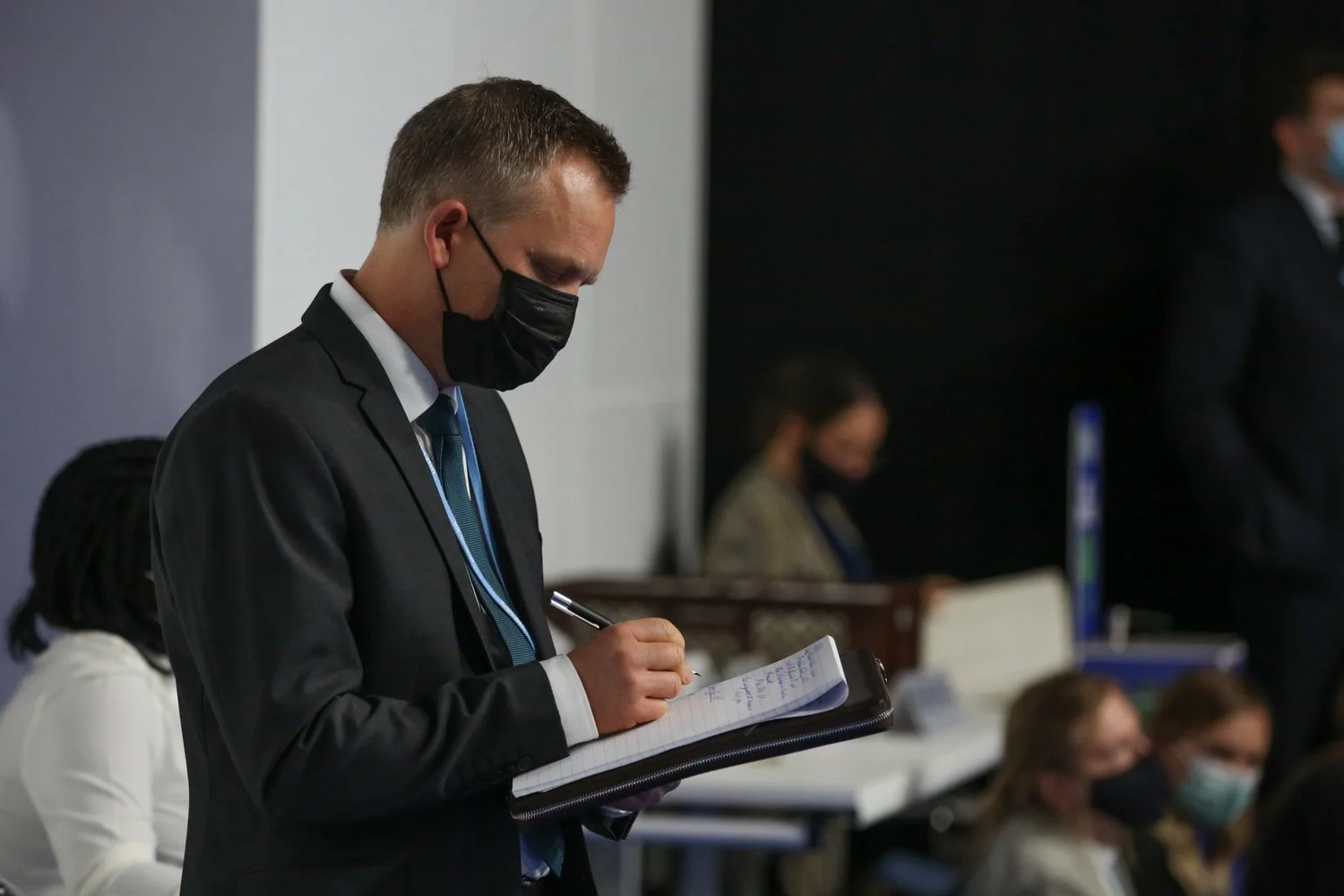 Brent Kerrigan taking notes at COP26, Glasgow 2021