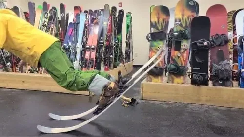 Ski tips flexing during a press demonstration
