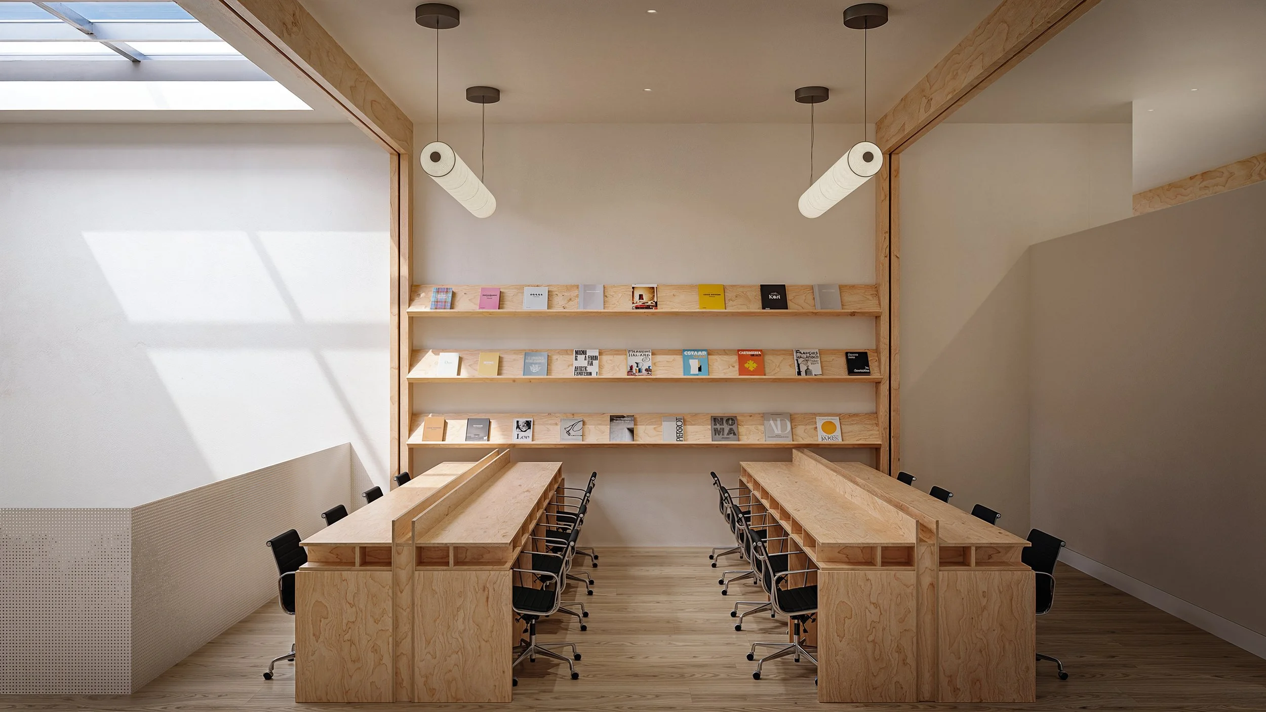 Bay Street Office — skylit workroom with long timber tables and a wall of display shelving, Arts District, Downtown Los Angeles