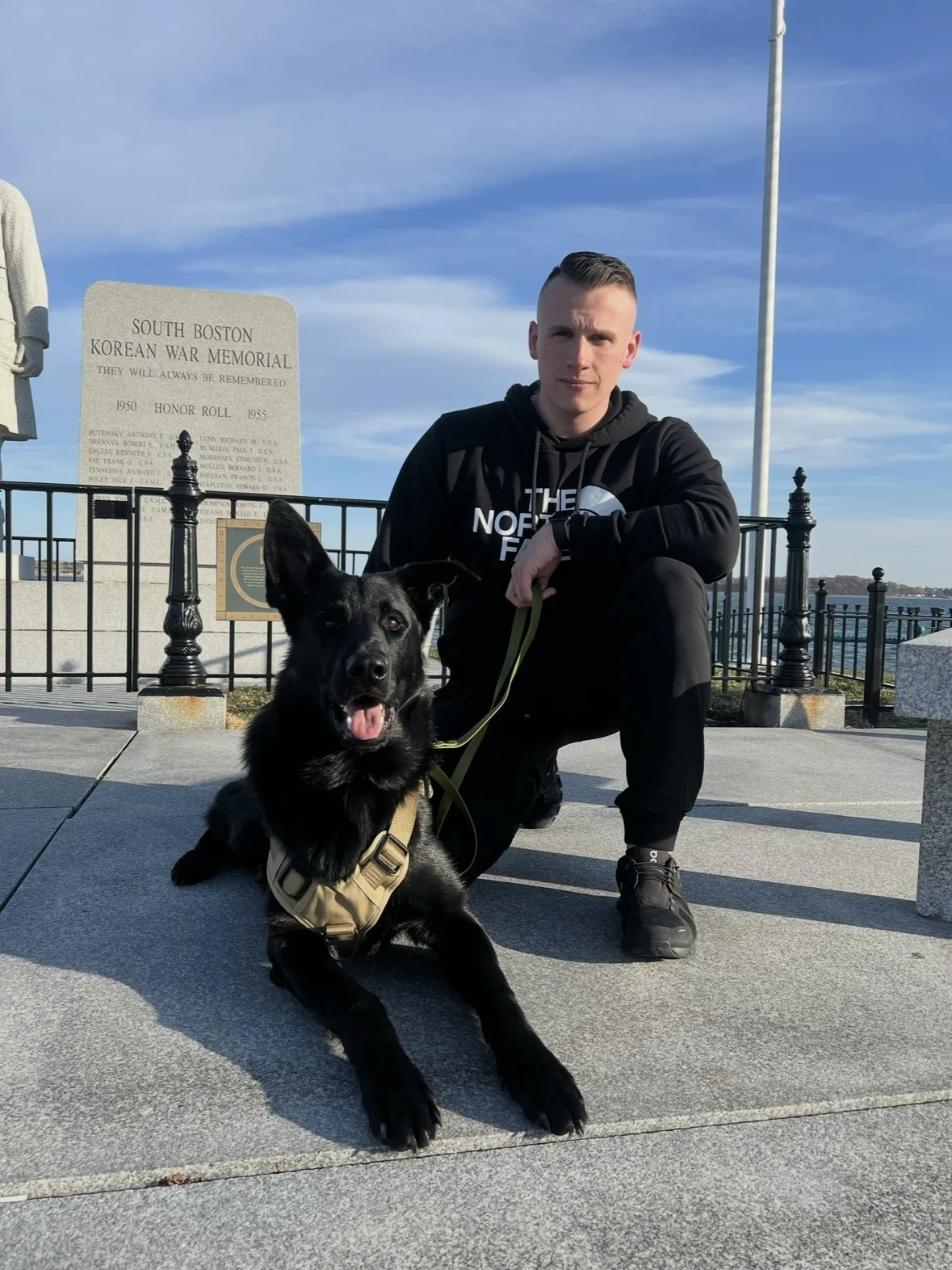 Connor with his dog Ranger at the South Boston Korean War Memorial