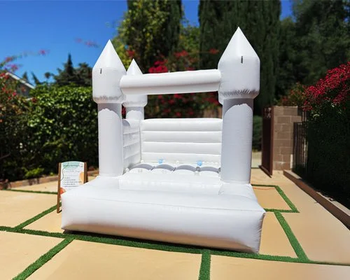 Minimalist all-white bounce house for young kids, perfect for any backyard party