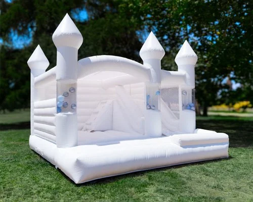 Happy Castle — large white bounce house with slide