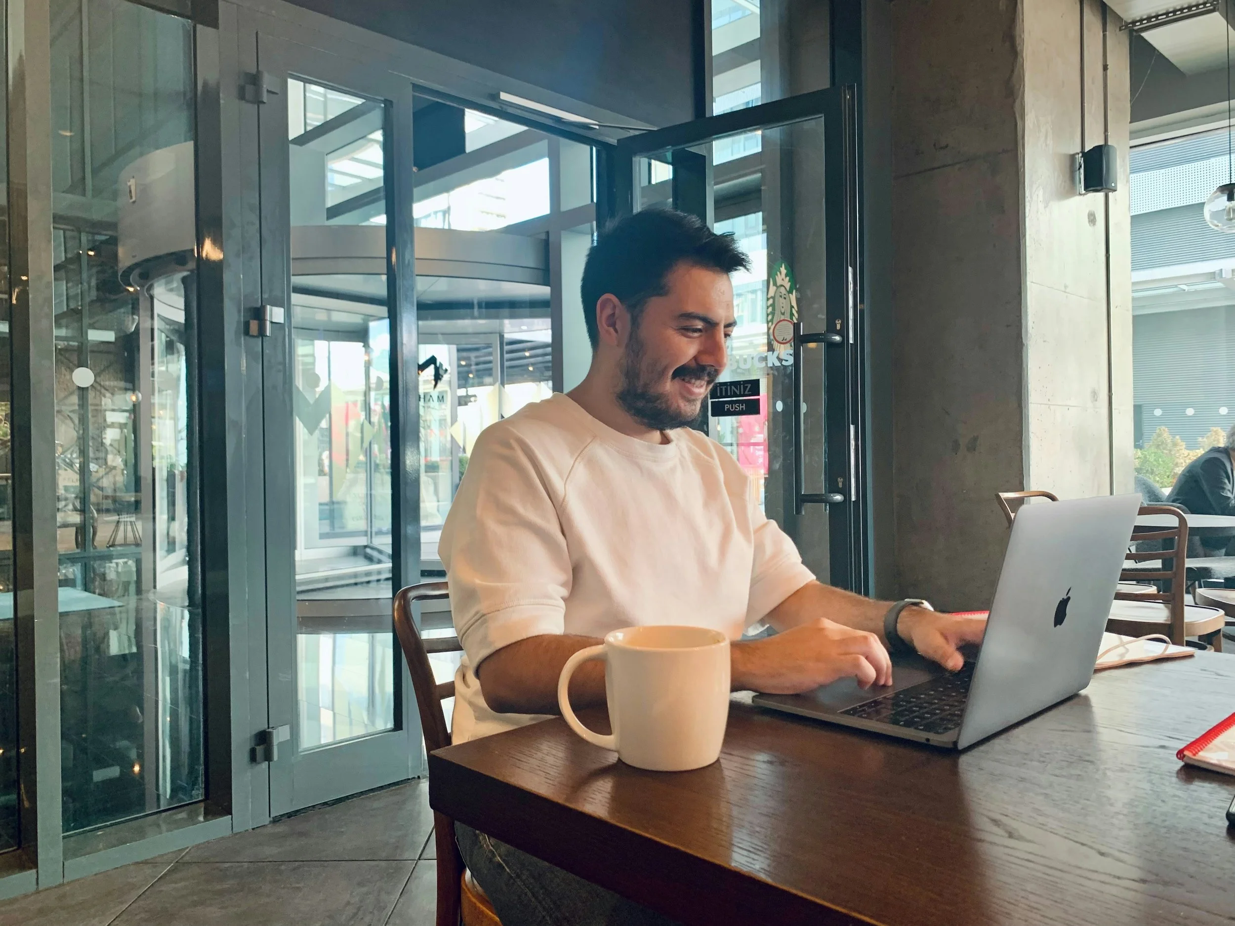 Loan officer working remotely on a laptop with the freedom to serve clients