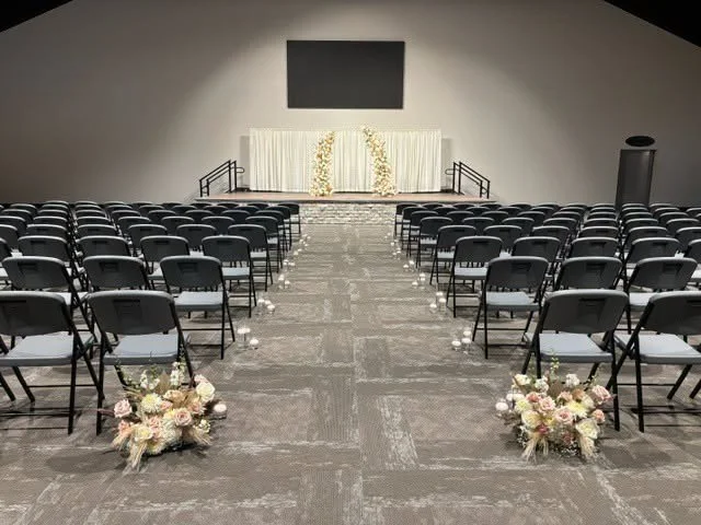 Grand Hall at Tower Event and Conference Center set with round tables for a wedding reception in Marietta, Ohio