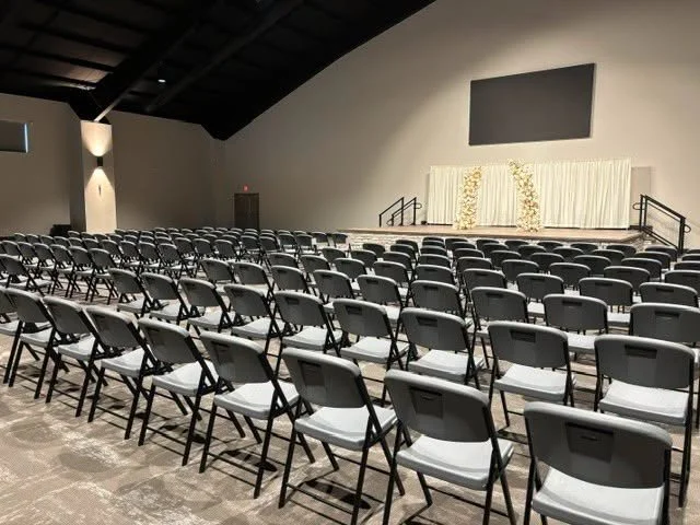 Wedding reception layout with round tables and dance floor in the Grand Hall in Marietta, Ohio