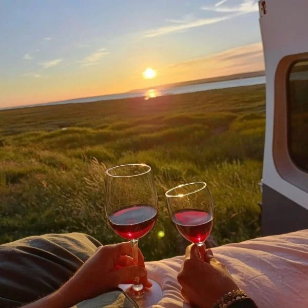 Two glasses of wine at sunset from the van