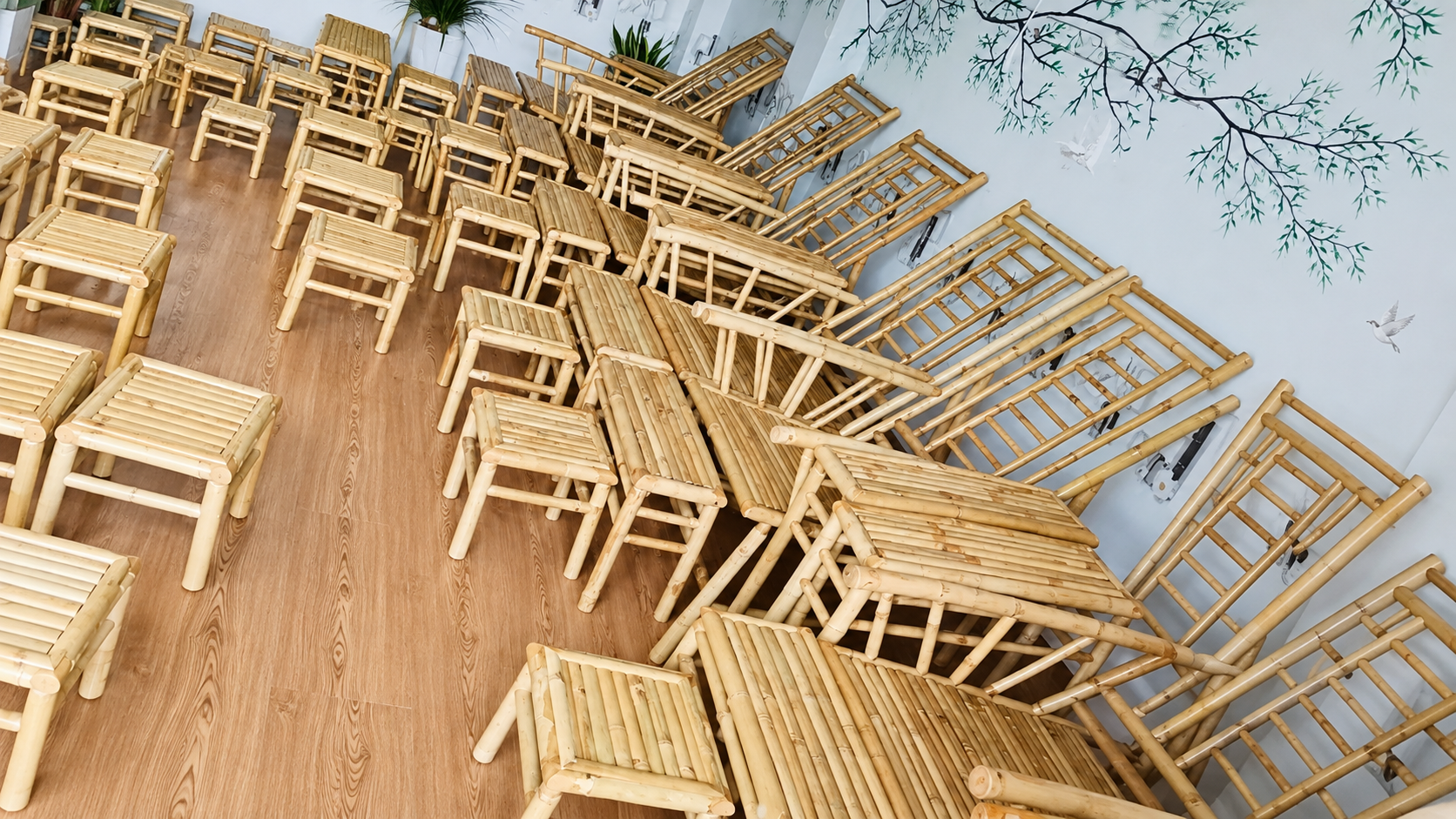 Rows of handcrafted bamboo chairs from a single production run in Vietnam
