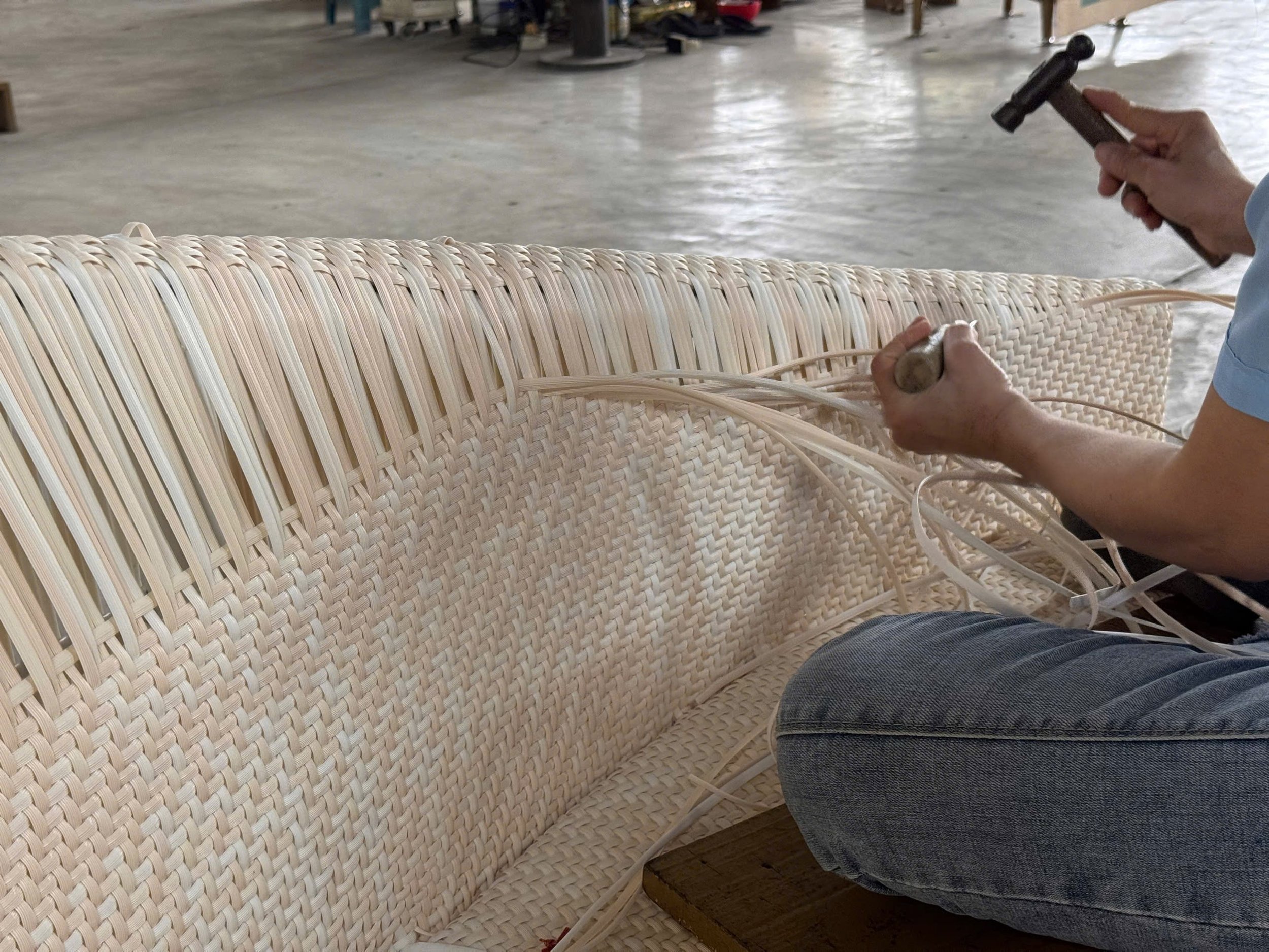 Vietnamese artisan handcrafting furniture