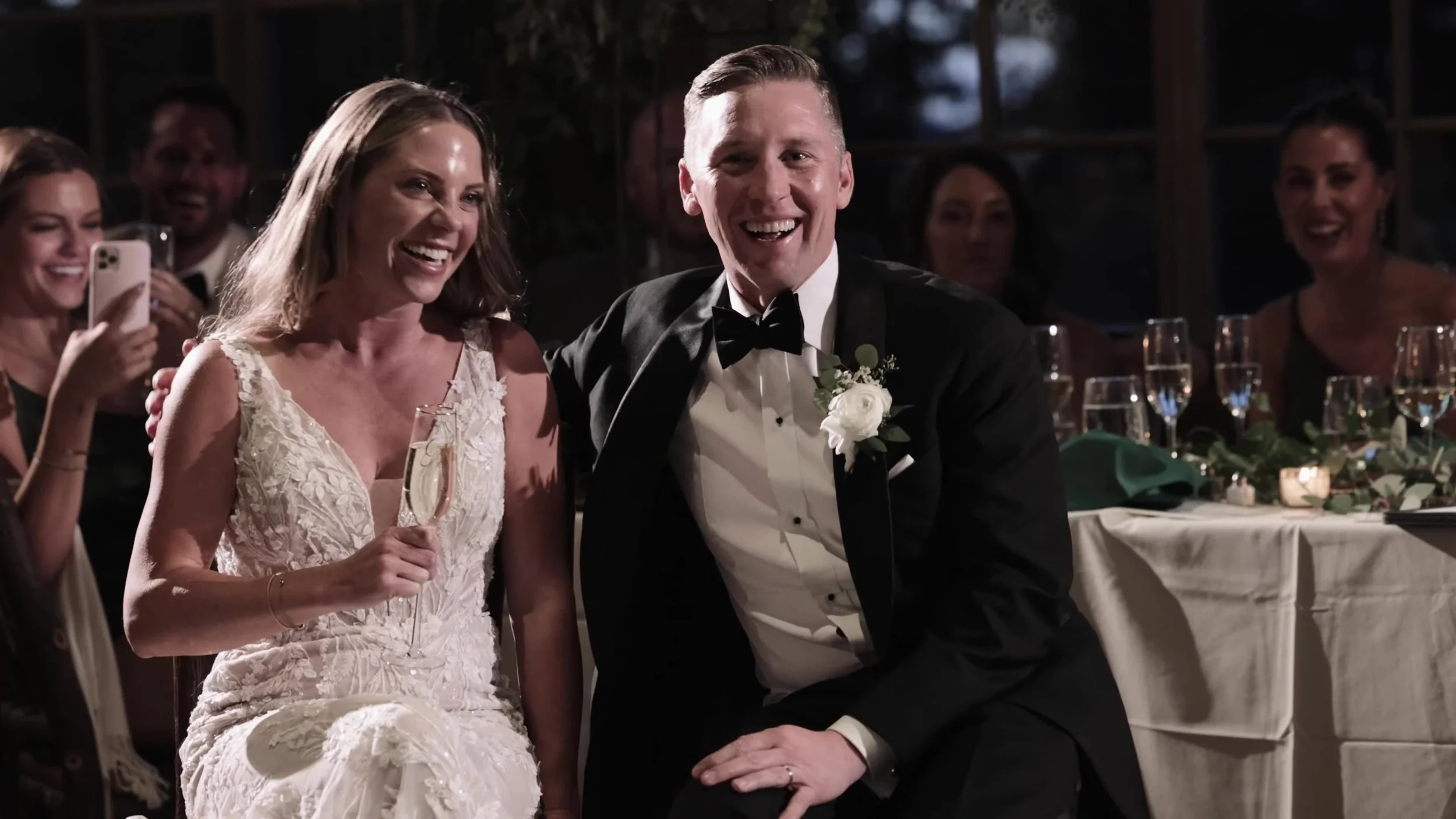 Caitlin and Matthew laughing at their Ten Mile Station reception in Breckenridge, Colorado