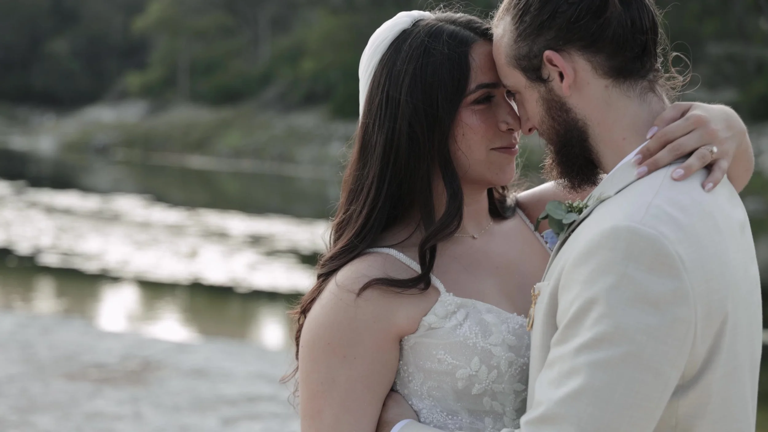 Peter and Kiyara forehead to forehead intimate close at Videre Estate near Austin Texas Hill Country