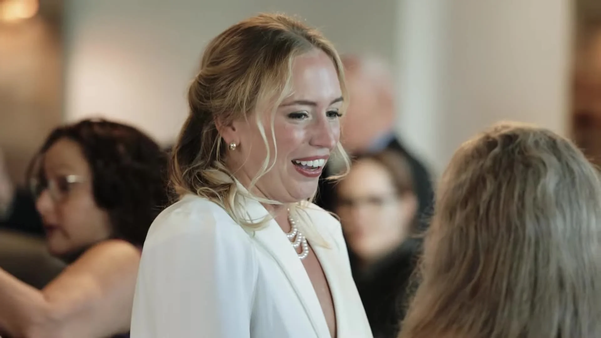 Rachel laughing at the reception at Canyonwood Ridge in Dripping Springs, Texas