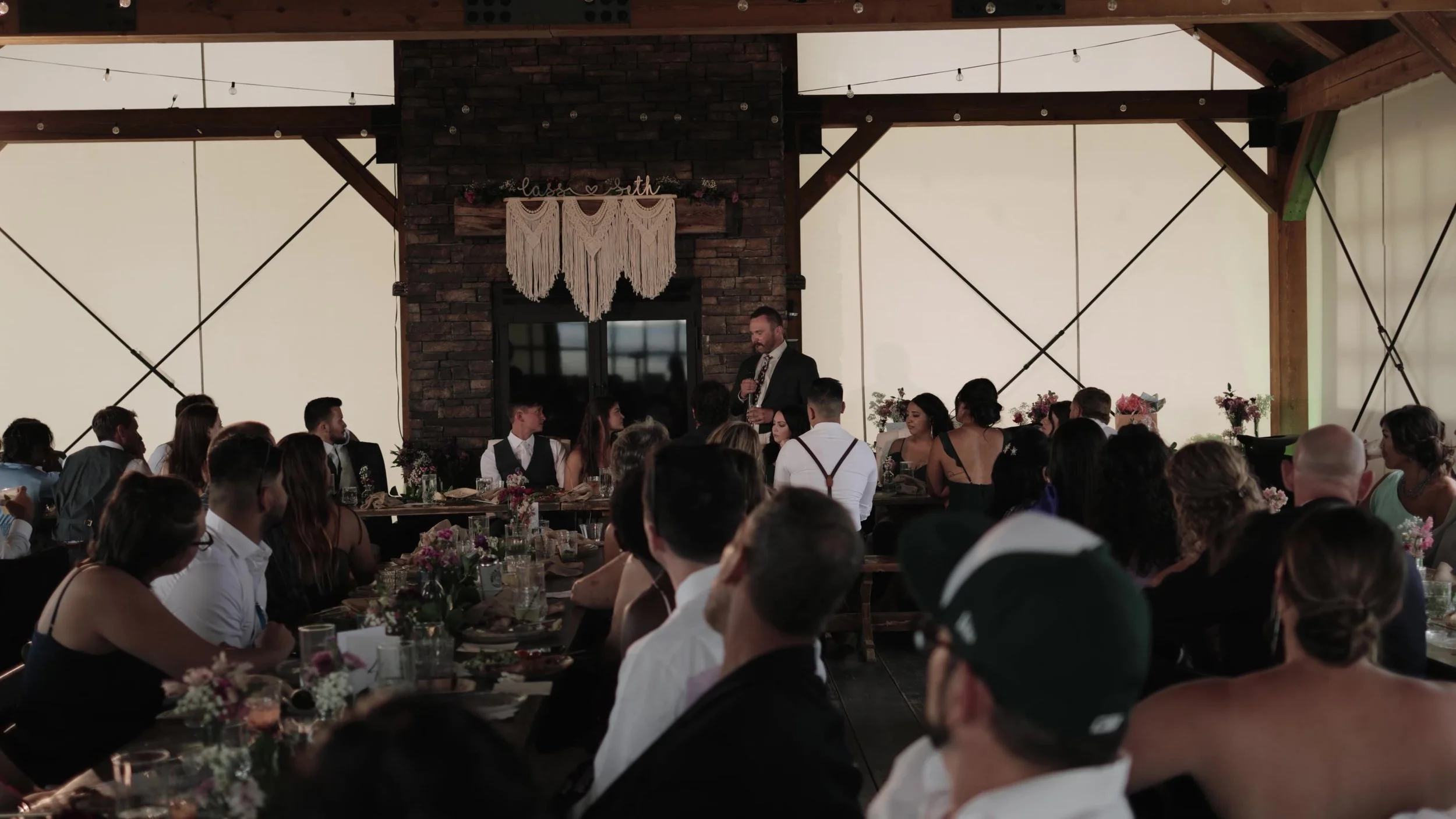Reception dinner in the timber pavilion at 3 Peaks Ranch in Westcliffe, Colorado