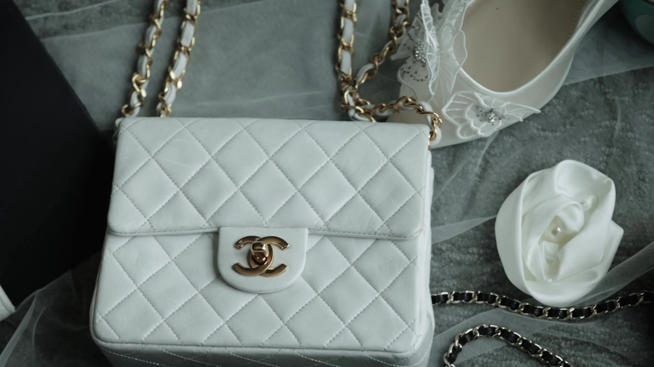 White quilted Chanel handbag camellia and lace detail for a black and white wedding at Barton Creek Austin