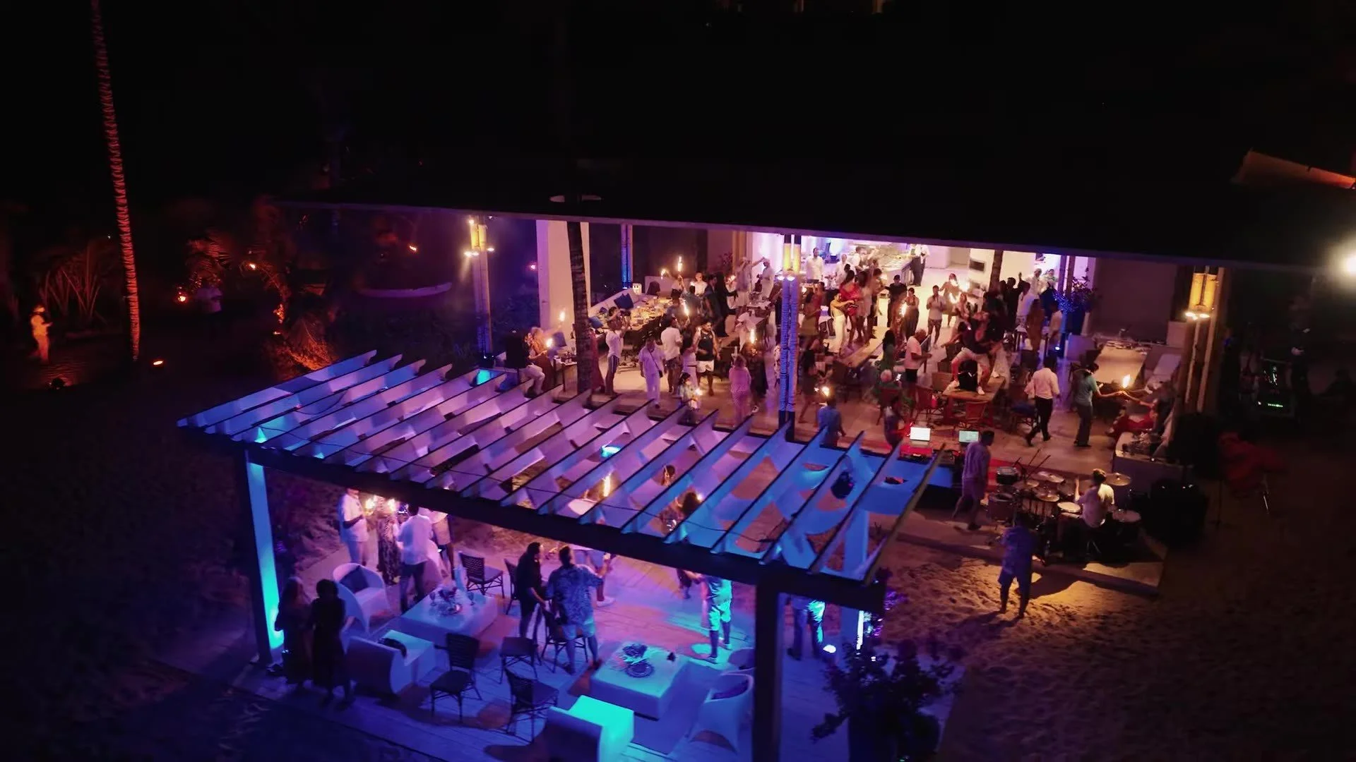 Night pergola lit blue and purple for the party at Amanera Dominican Republic