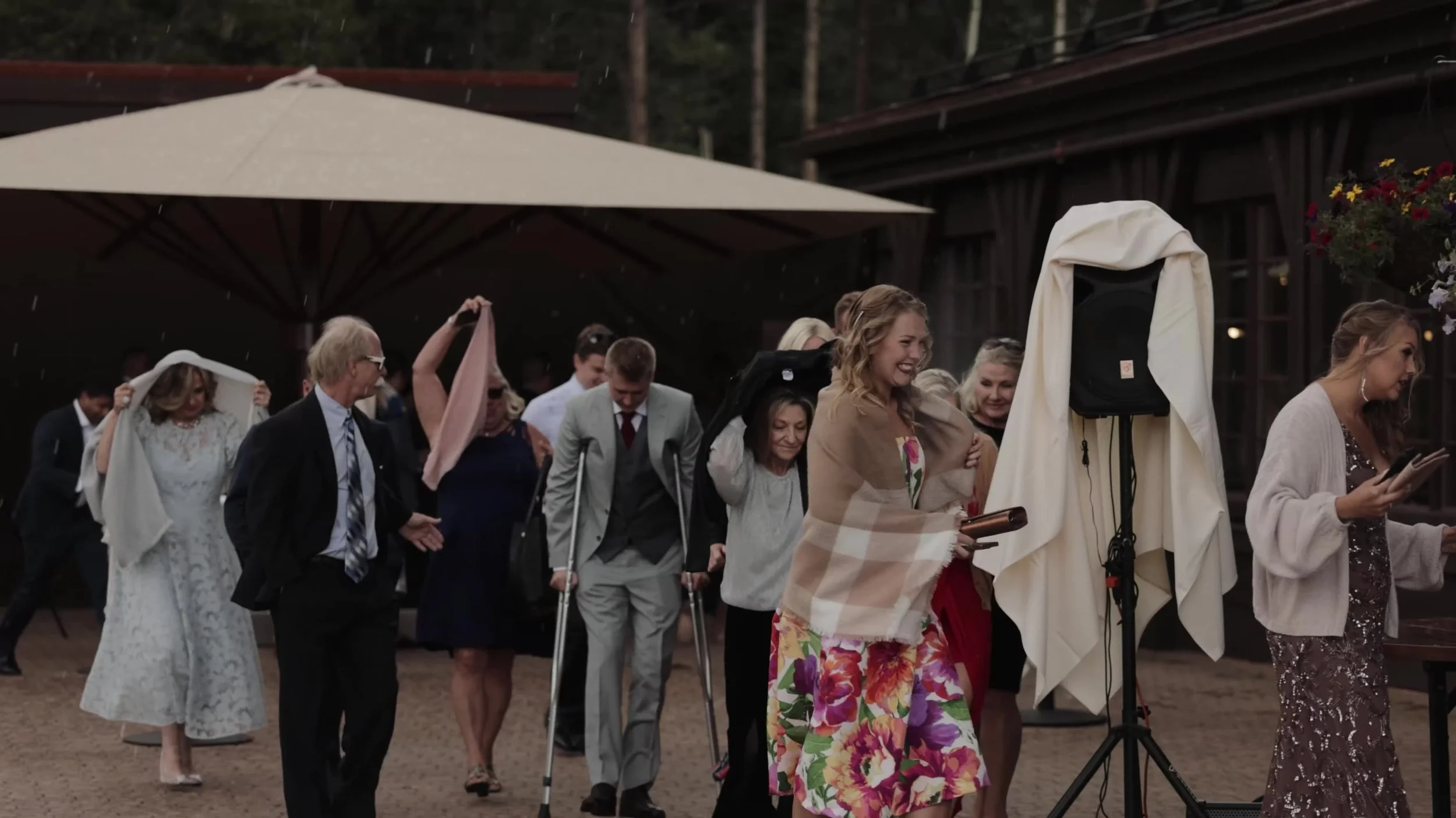 Wedding guests covering up as hail hits Ten Mile Station in Breckenridge, Colorado