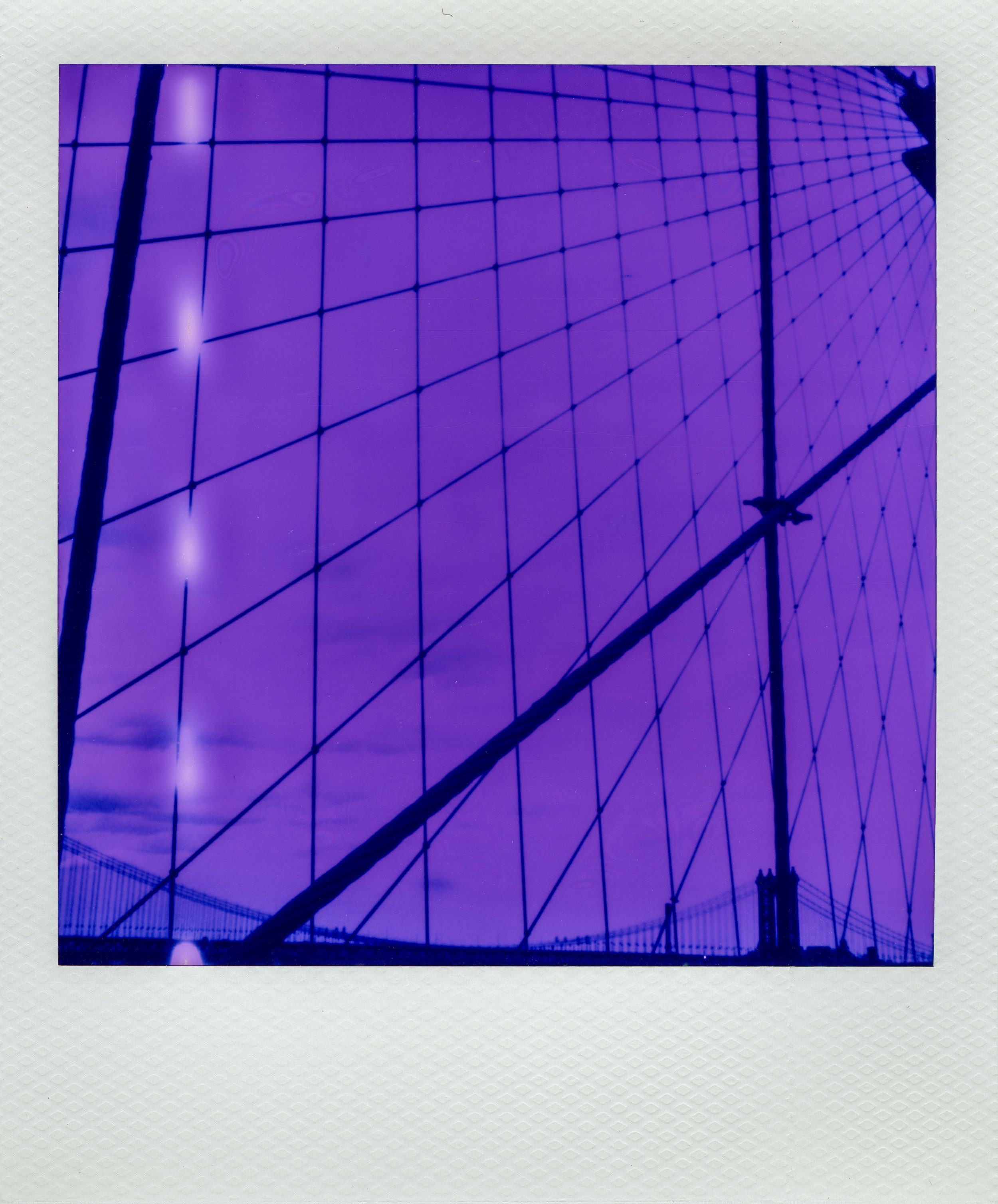 Brooklyn Bridge architecture photographed on Purple 600 Film