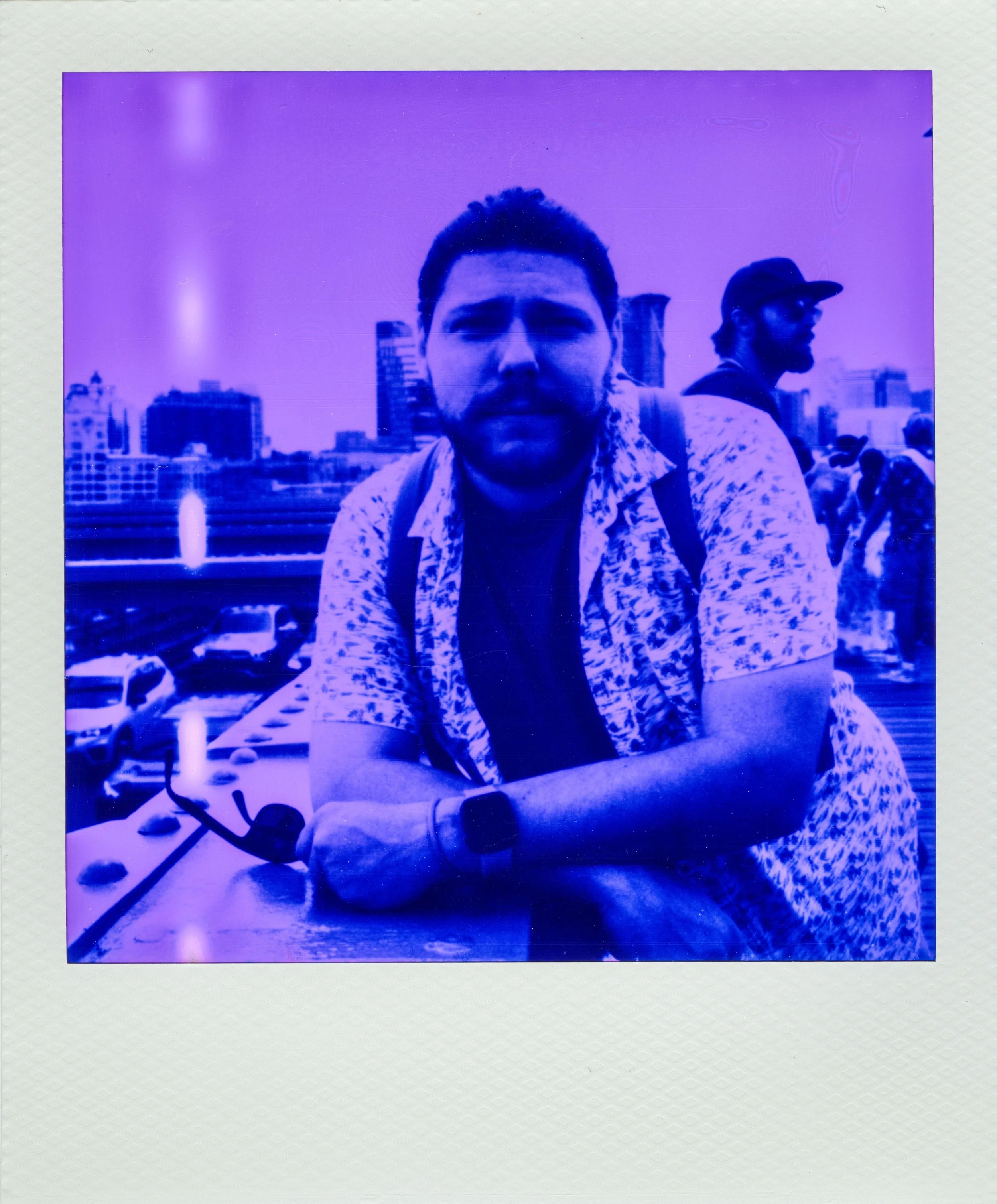 Portrait on the Brooklyn Bridge photographed on Purple 600 Film