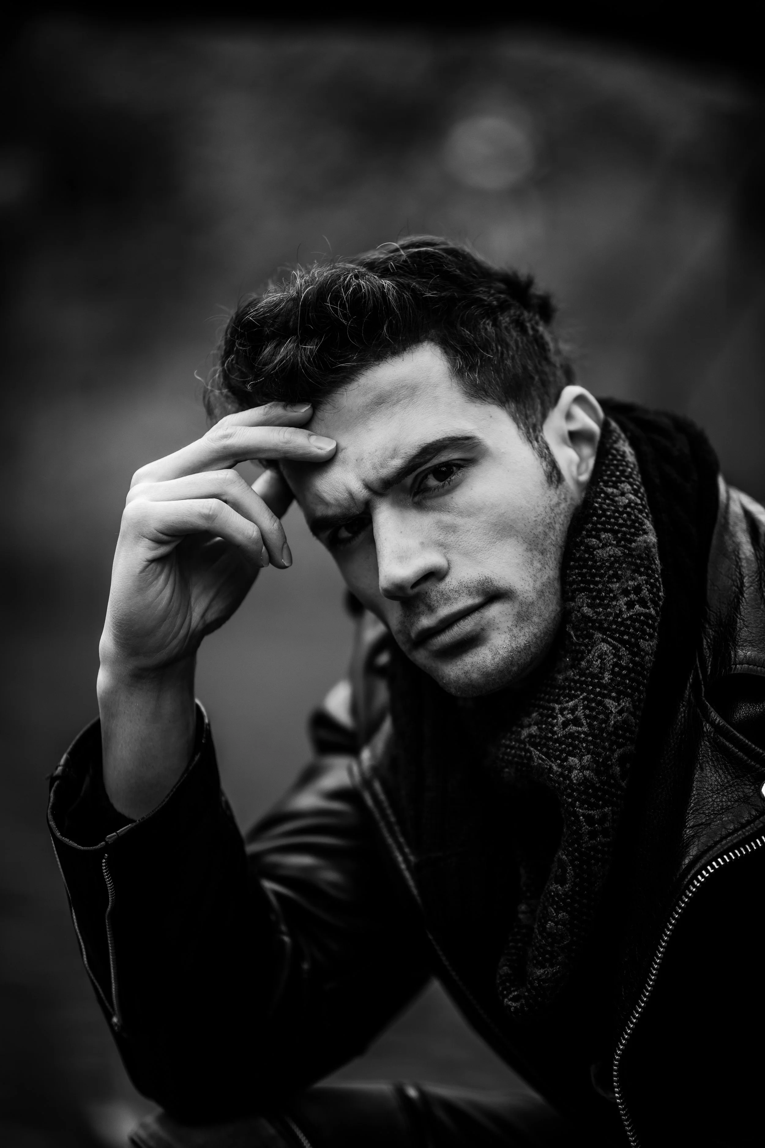 Black and white close-up portrait with intense expression.