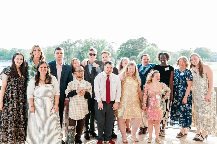 Citizens, volunteers and staff dressed up together at a 210 Collective celebration