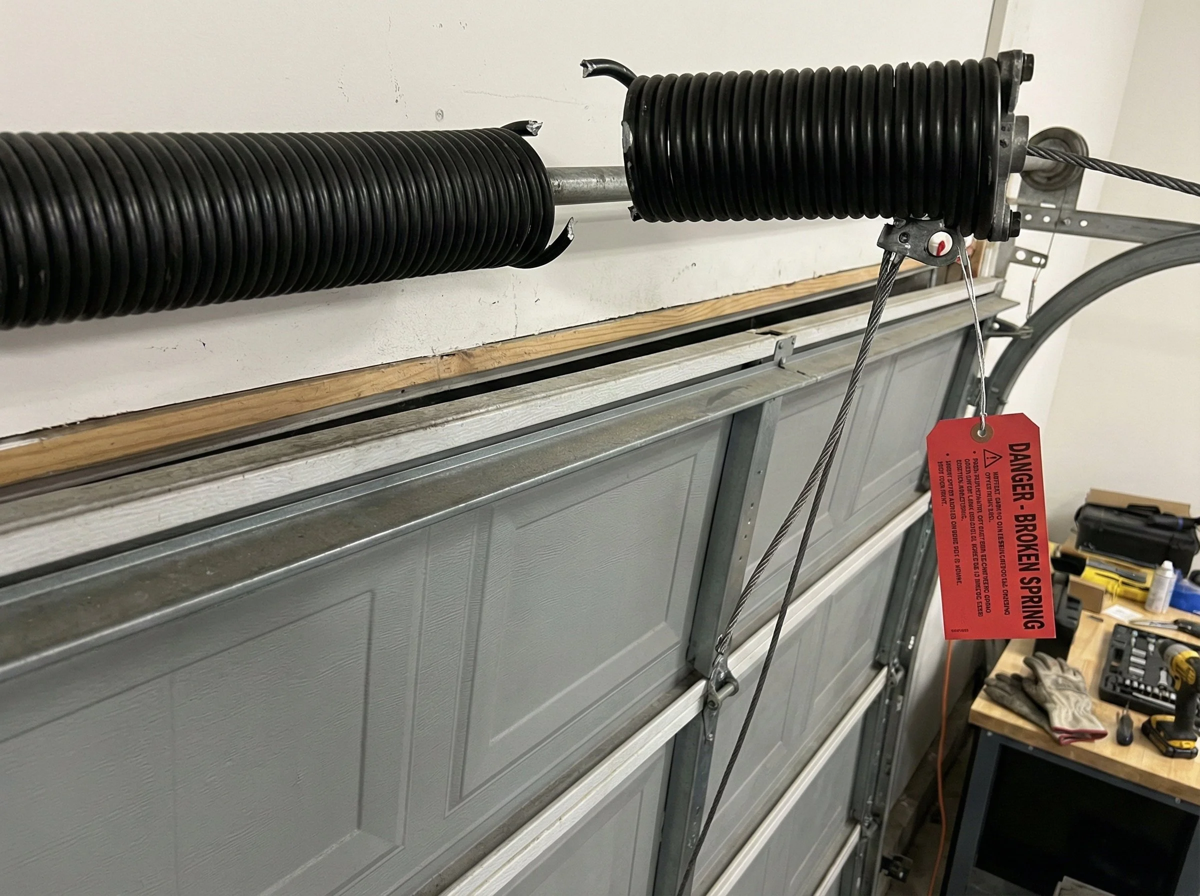 Gebroken veer overhead deur