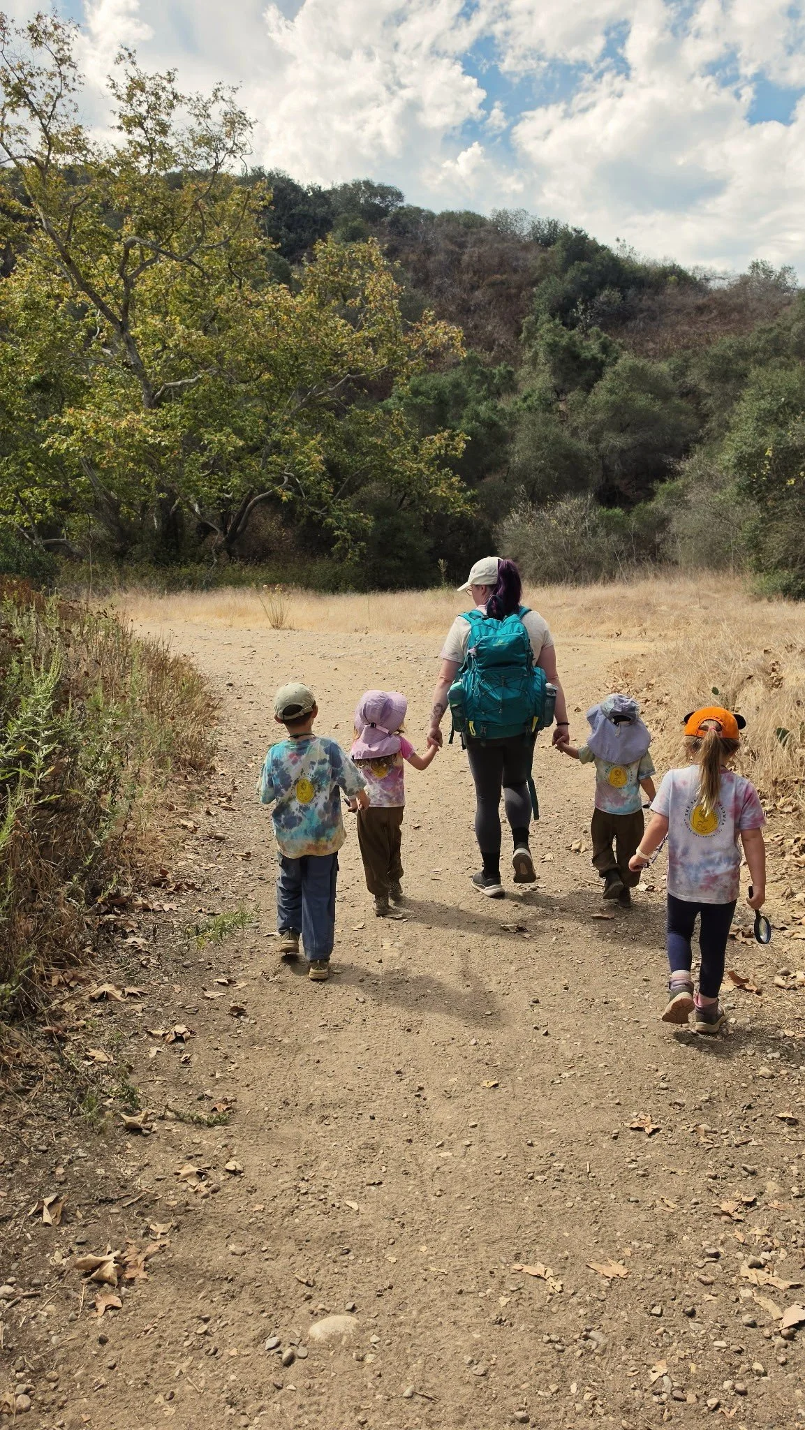 Children exploring outdoors at The Salty Sunflower Nature School