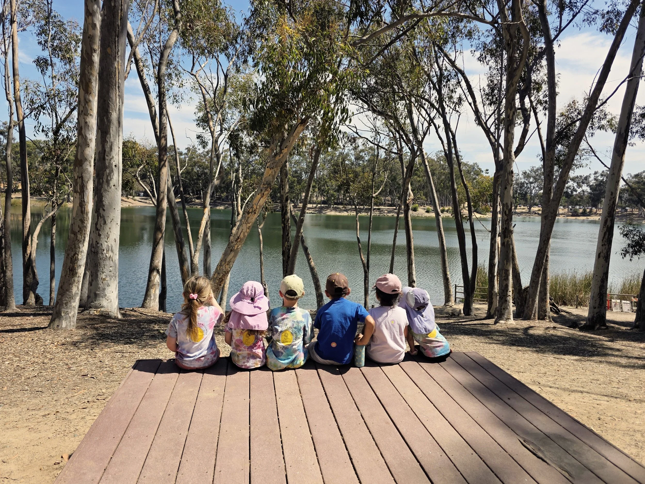 Children exploring outdoors in a natural San Diego landscape
