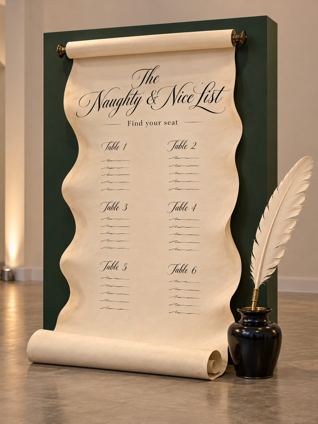 Concept for Santa’s oversized scroll seating chart with a giant quill and ink pot.