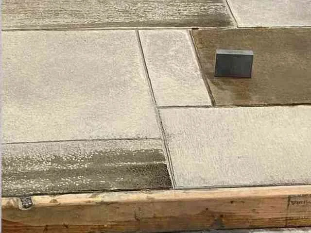 Custom saw-cut concrete with a clean tile pattern by Colorful Concrete LLC in Greeley, Colorado