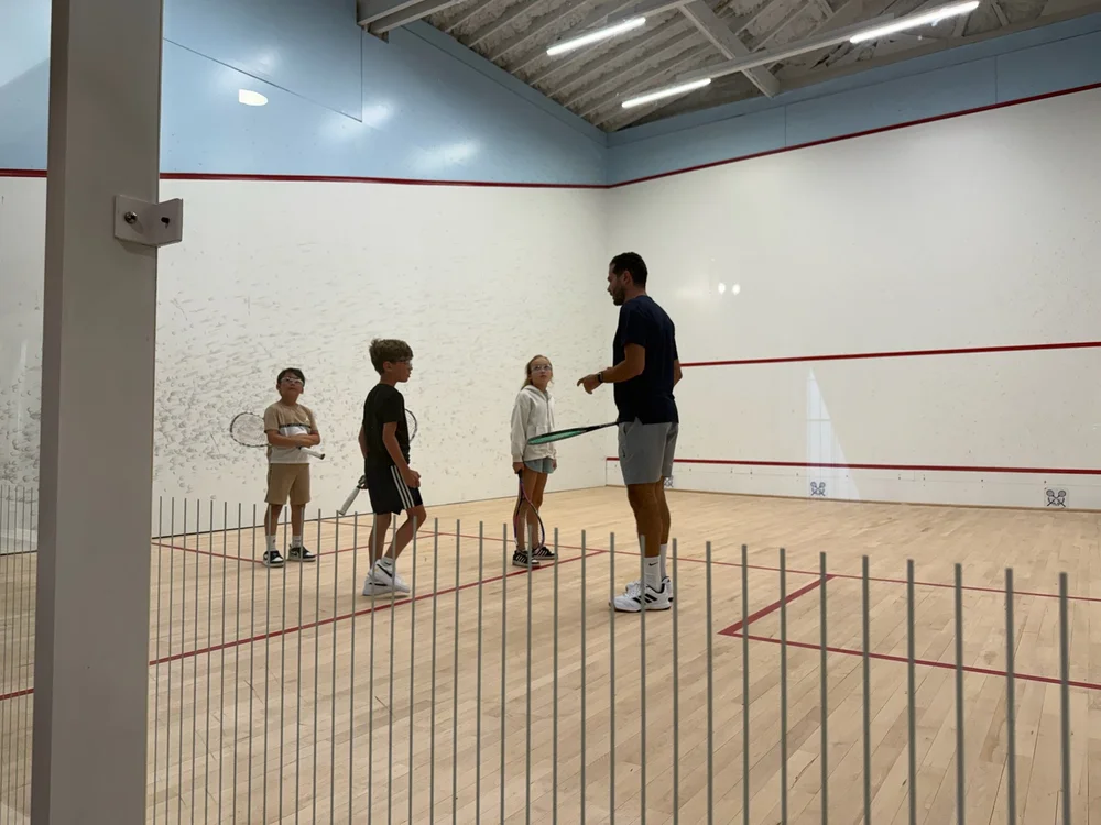 Karim Abdel Gawad coaching junior squash players at Monmouth Squash & Swim