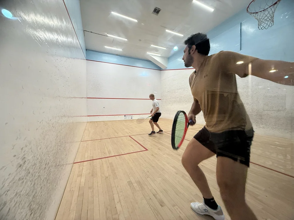 Omar Mosaad in action on a Monmouth squash court