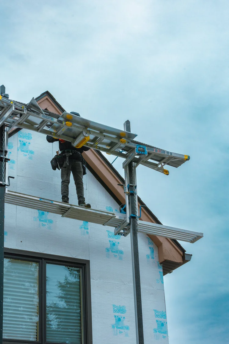 Siding repair work by Next Exteriors crew in Metro Detroit