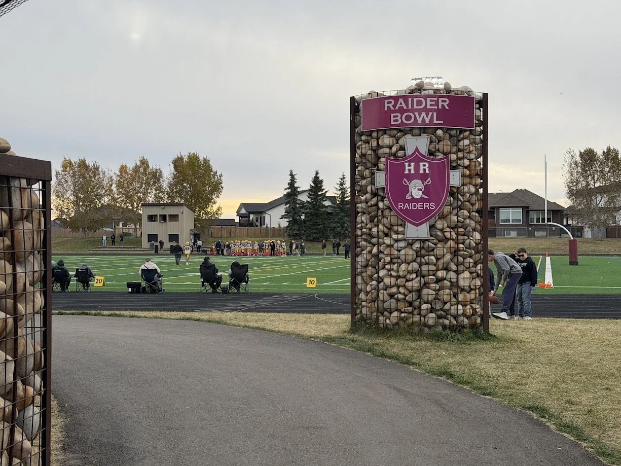 The Raider Bowl football field in Lloydminster on an autumn evening