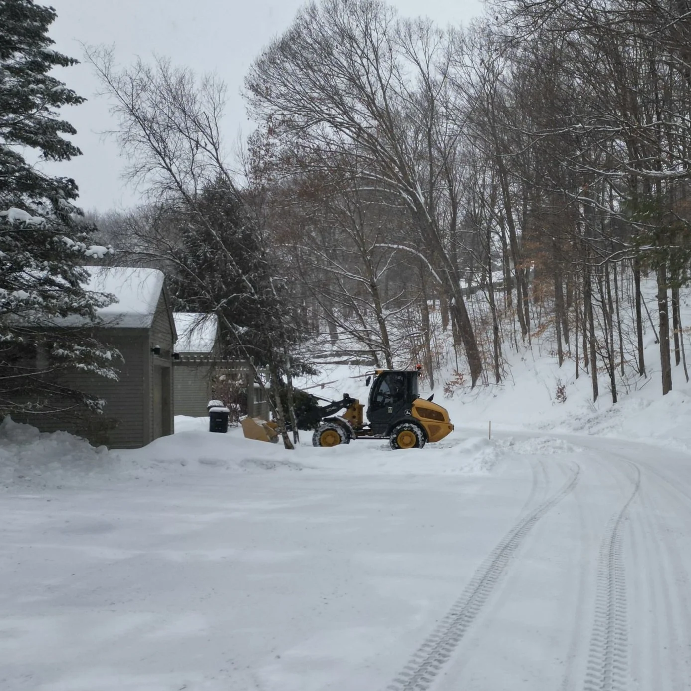 Thompson Site Services commercial snow removal equipment clearing snow in the Upper Valley