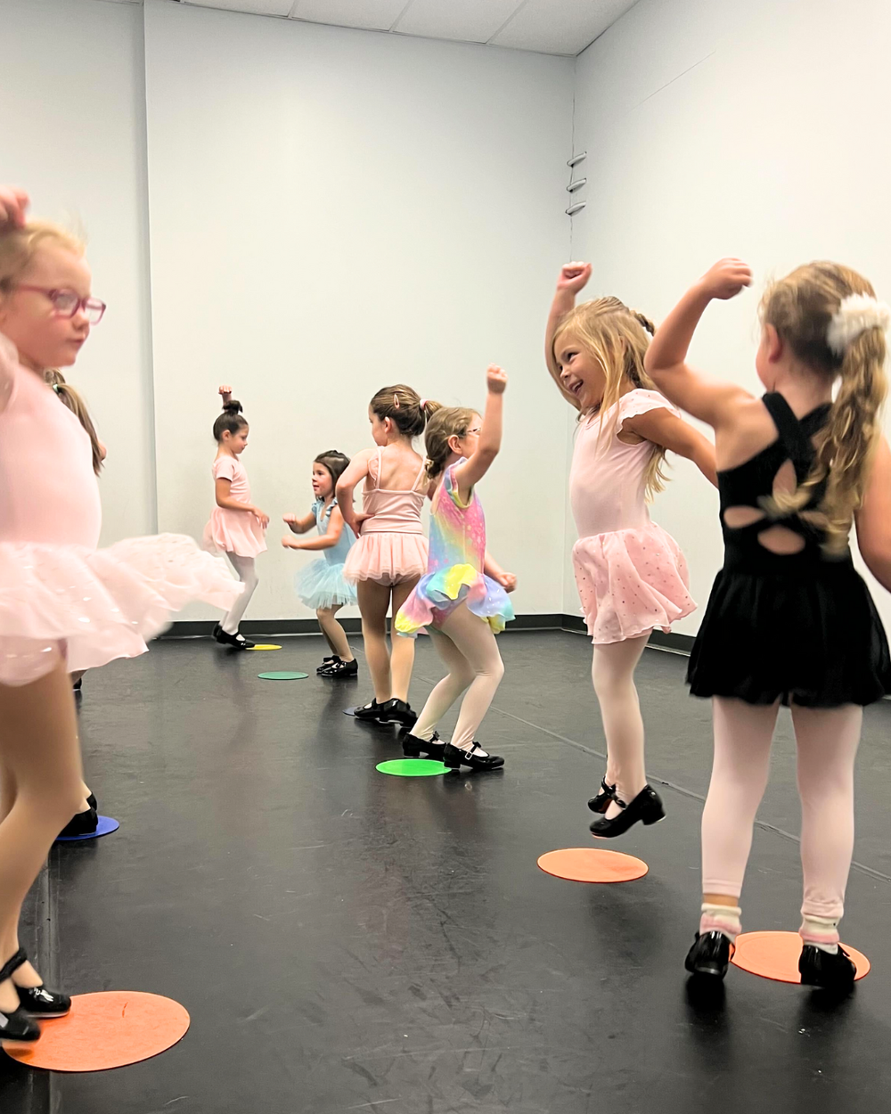 Dancers exploring movement together in class