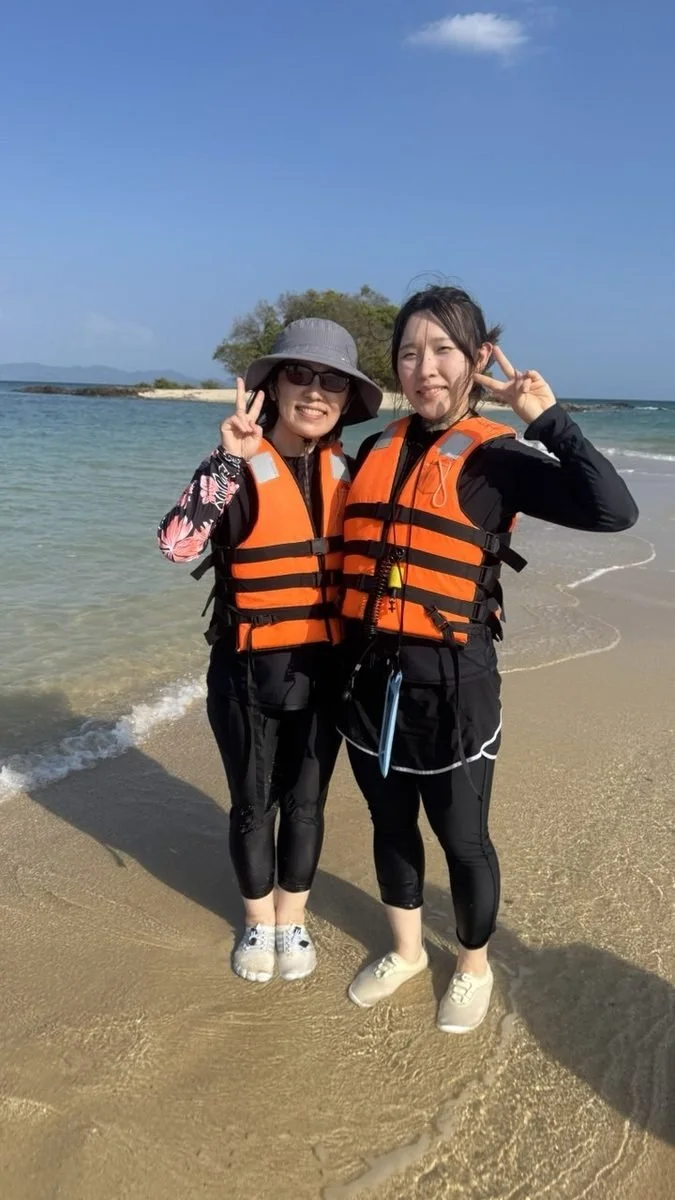 Guests on the shore after a morning in the water