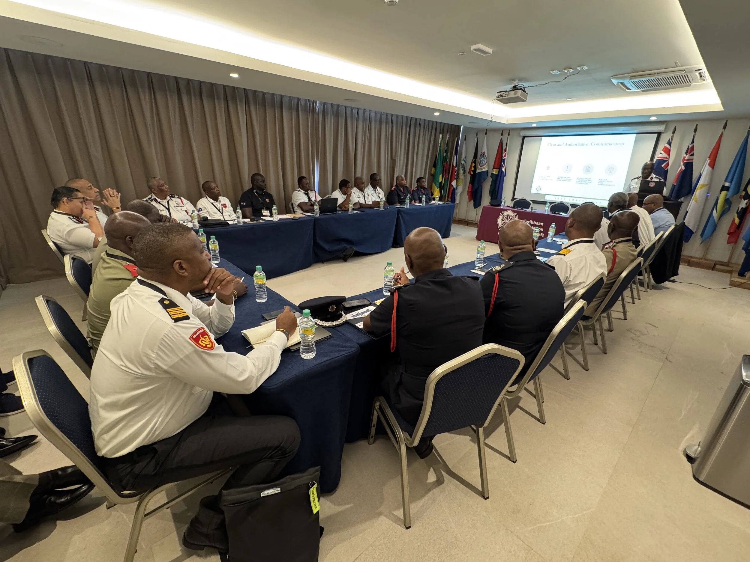 CAFC 2025 Conference — Think Regional session room with Caribbean flags